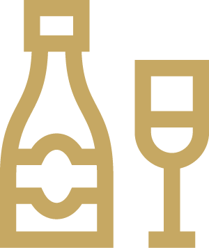  A minimalist gold icon of a champagne bottle and a filled flute glass, symbolizing celebrations and the venue's hospitality.